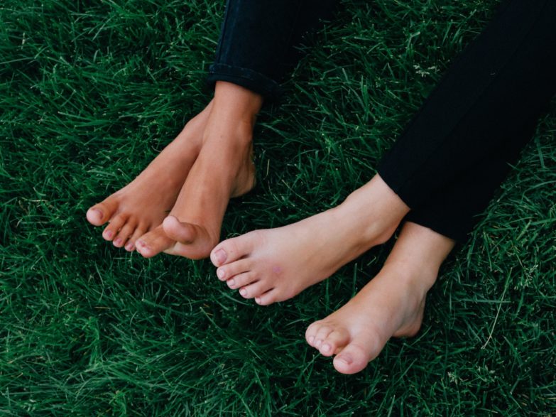 feet on the grass